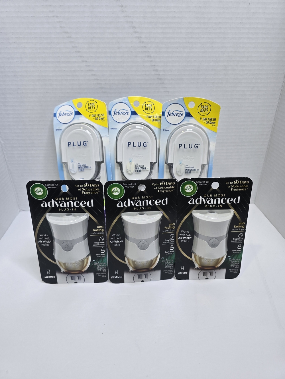 Febreze and Air Wick Plug-In Air Freshener Value Pack in White and Black